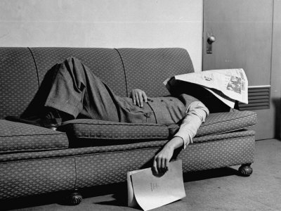 dorsey-paul-writer-niven-busch-lying-on-sofa-with-newspaper-over-his-face-as-he-takes-nap-from-screenwriting