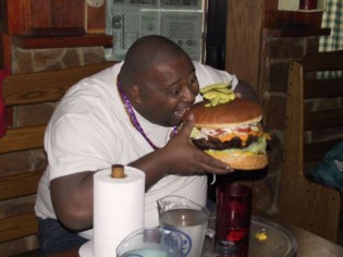 weird-people-fat-guy-eating-huge-hamburger