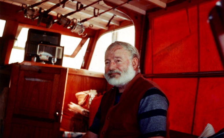 Hemingway aboard his boat off the coast of Cuba (1950)